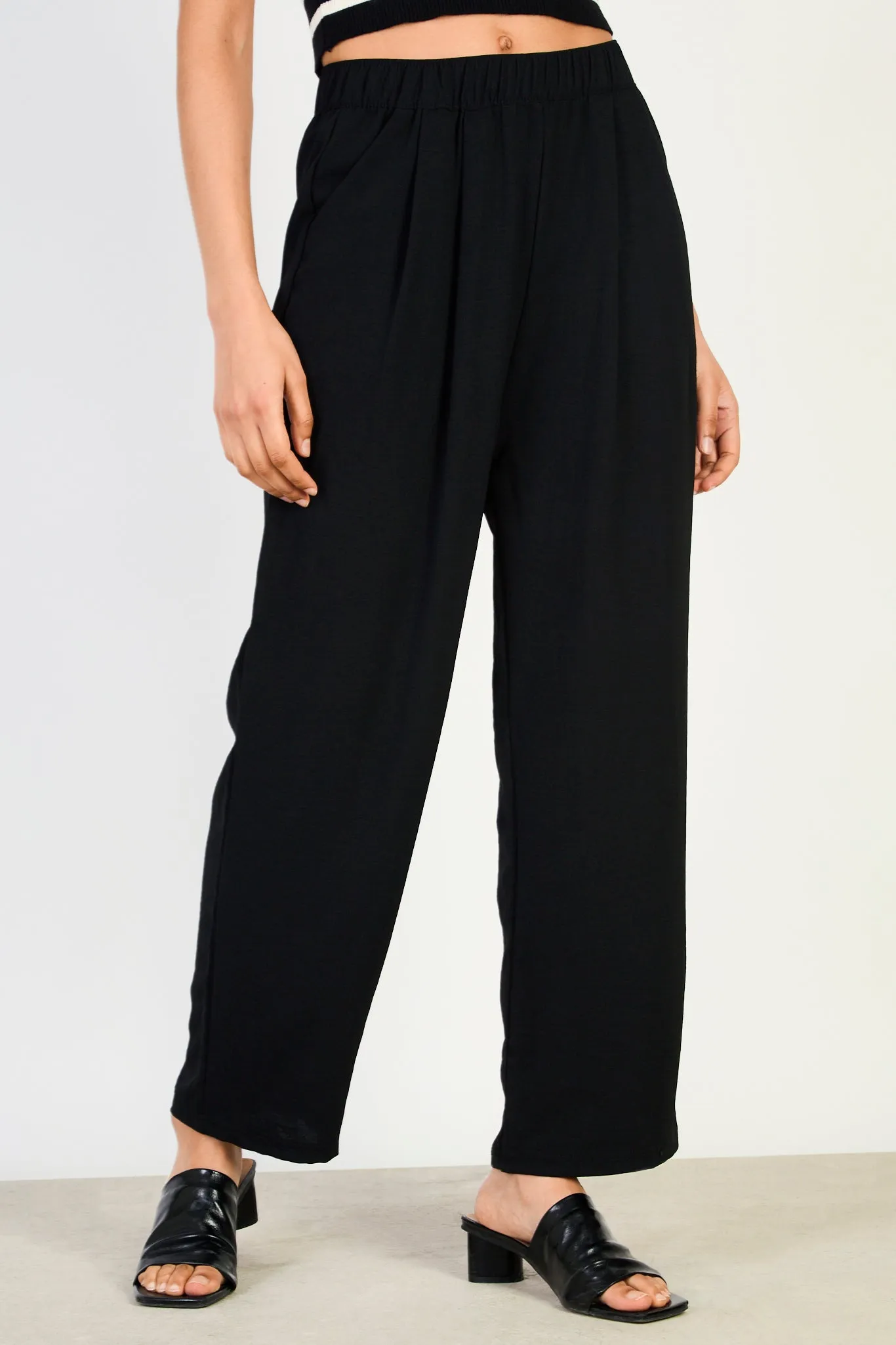 Black crinkled relaxed trousers