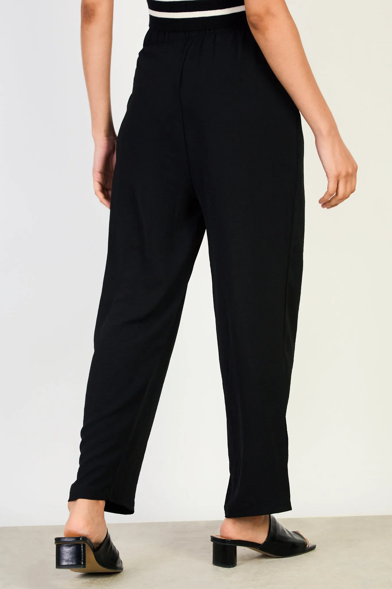 Black crinkled relaxed trousers